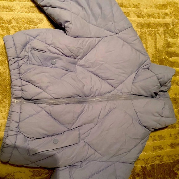 I got this puffer last year but have no worn it. It’s been never worn. - Picture 2 of 2